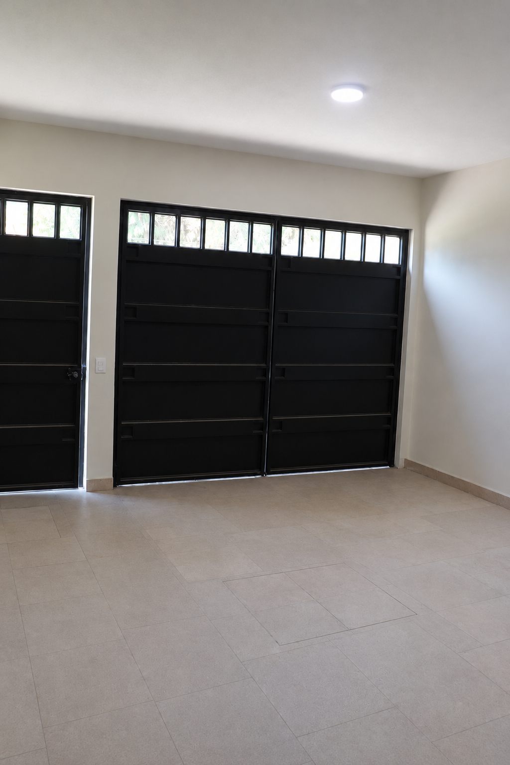 Private garage with black doors